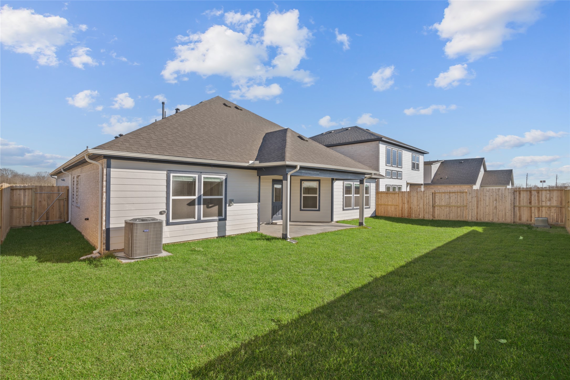 3222 Emerald Hills Drive Angleton, TX 77515 - Photo 30 of 31 a view of a house with a yard and porch
