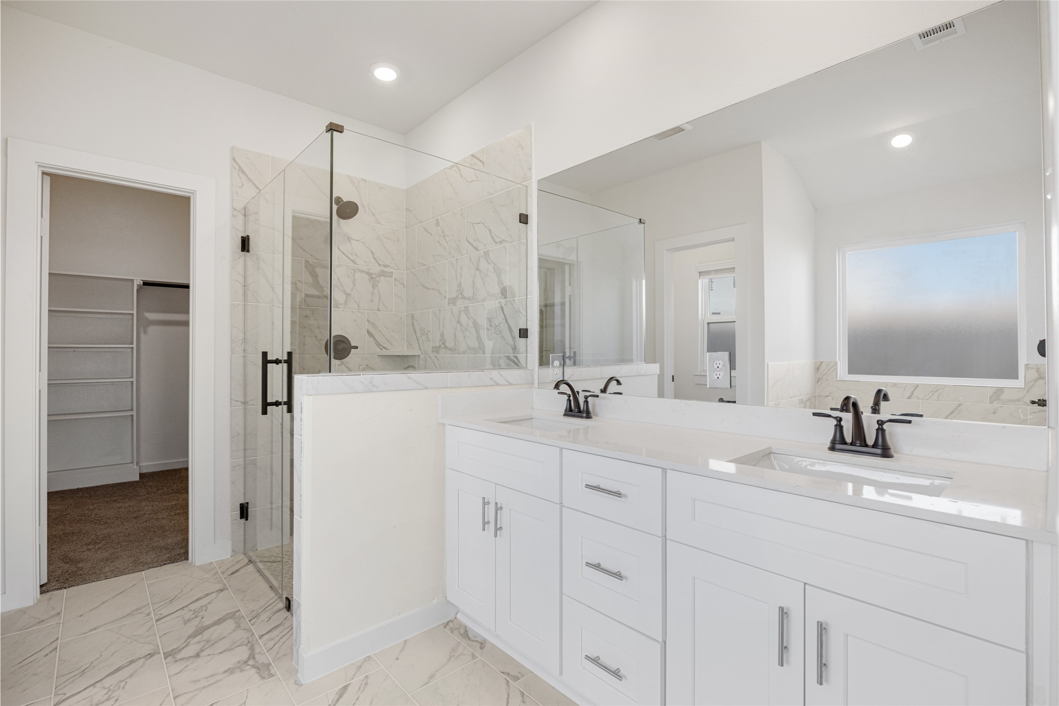 3222 Emerald Hills Drive Angleton, TX 77515 - Photo 4 of 31 a bathroom with double sink and a mirror