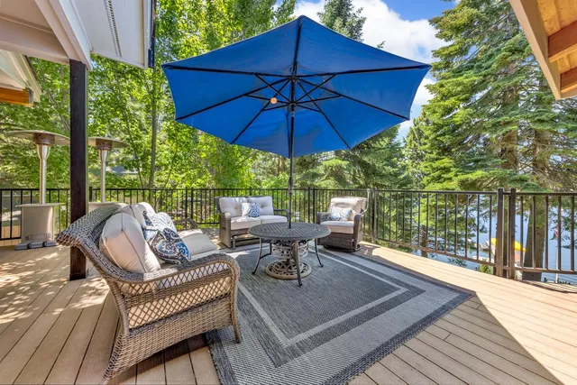 a view of balcony with couch and outdoor seating