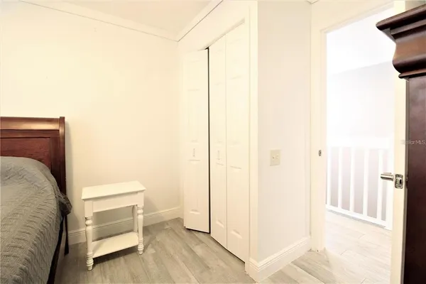a view of a living room with a wooden floor