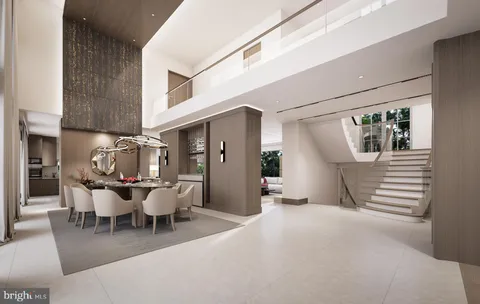 a dining room with furniture and entryway