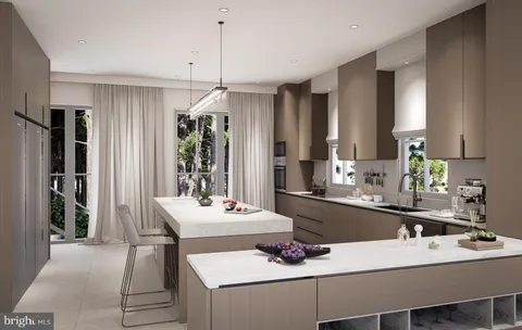 a kitchen with a dining table chairs and refrigerator