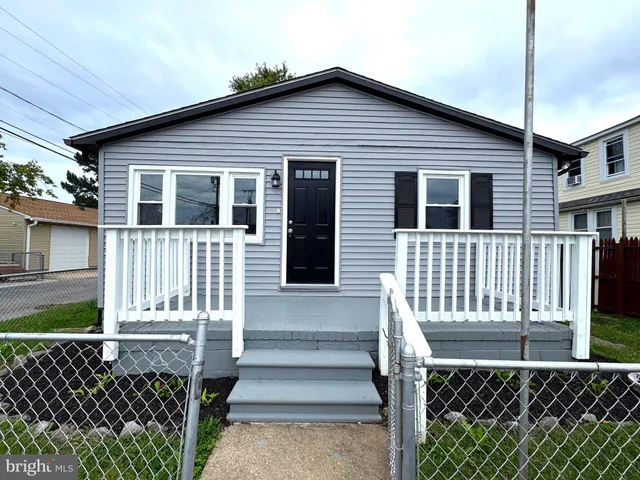 a front view of a house with a porch