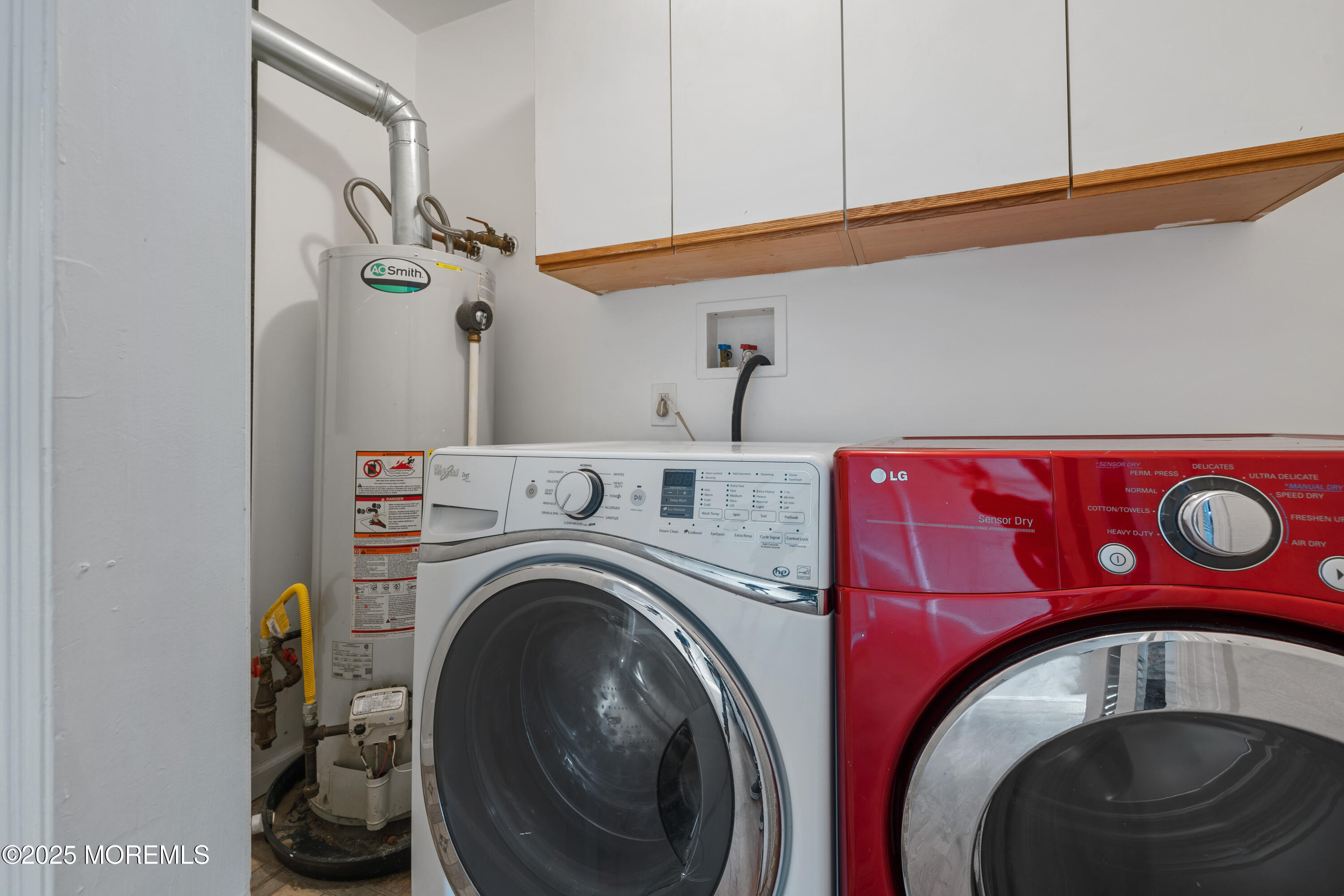 168 Stowaway Road Manahawkin, NJ 08050 - Photo 9 of 15 a utility room with dryer and washer
