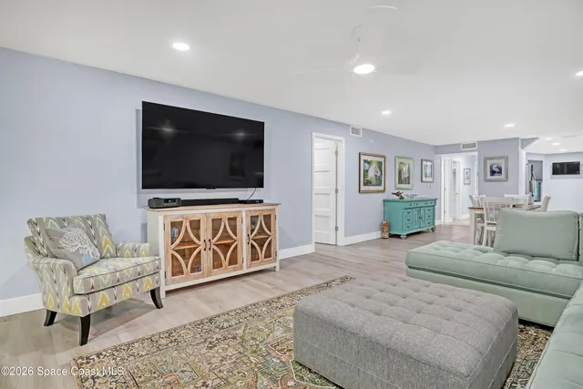a kitchen with stainless steel appliances granite countertop a stove sink and cabinets