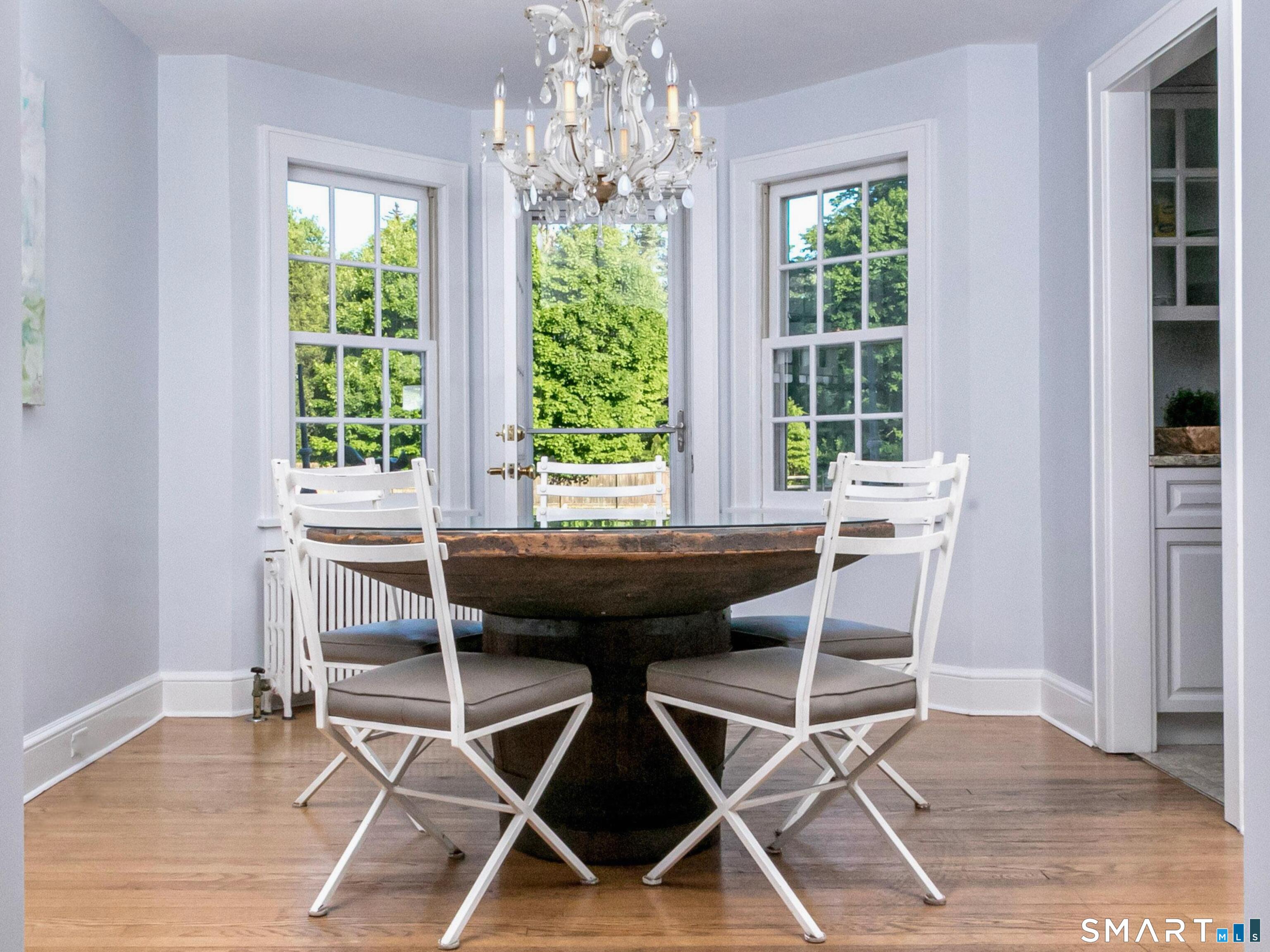 755 Stillson Road Fairfield, CT 06824 - Photo 5 of 10 Light filled dining area, with door to back garden.