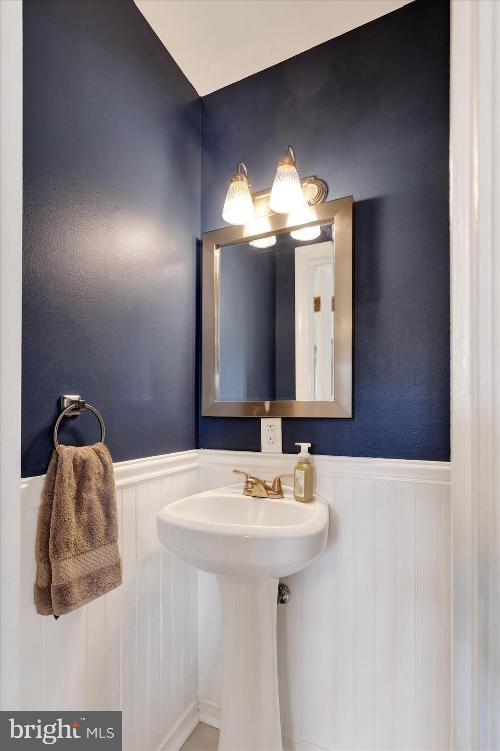 408 West 6th Street Lititz, PA 17543 - Photo 11 of 29 a bathroom with a sink and a mirror