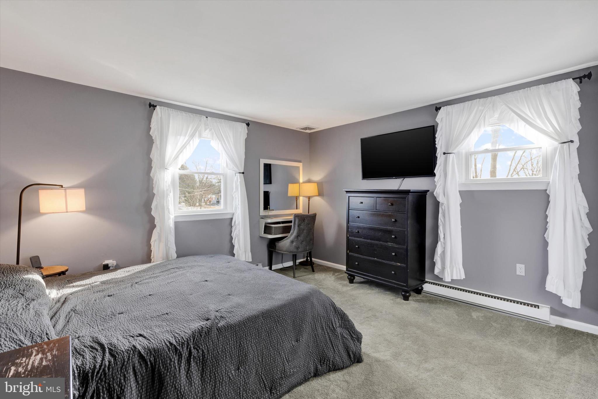 408 West 6th Street Lititz, PA 17543 - Photo 13 of 29 a bedroom with a bed and a television in it