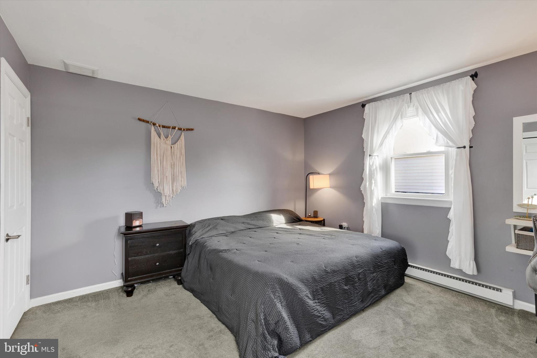 408 West 6th Street Lititz, PA 17543 - Photo 14 of 29 a bedroom with a bed and a window