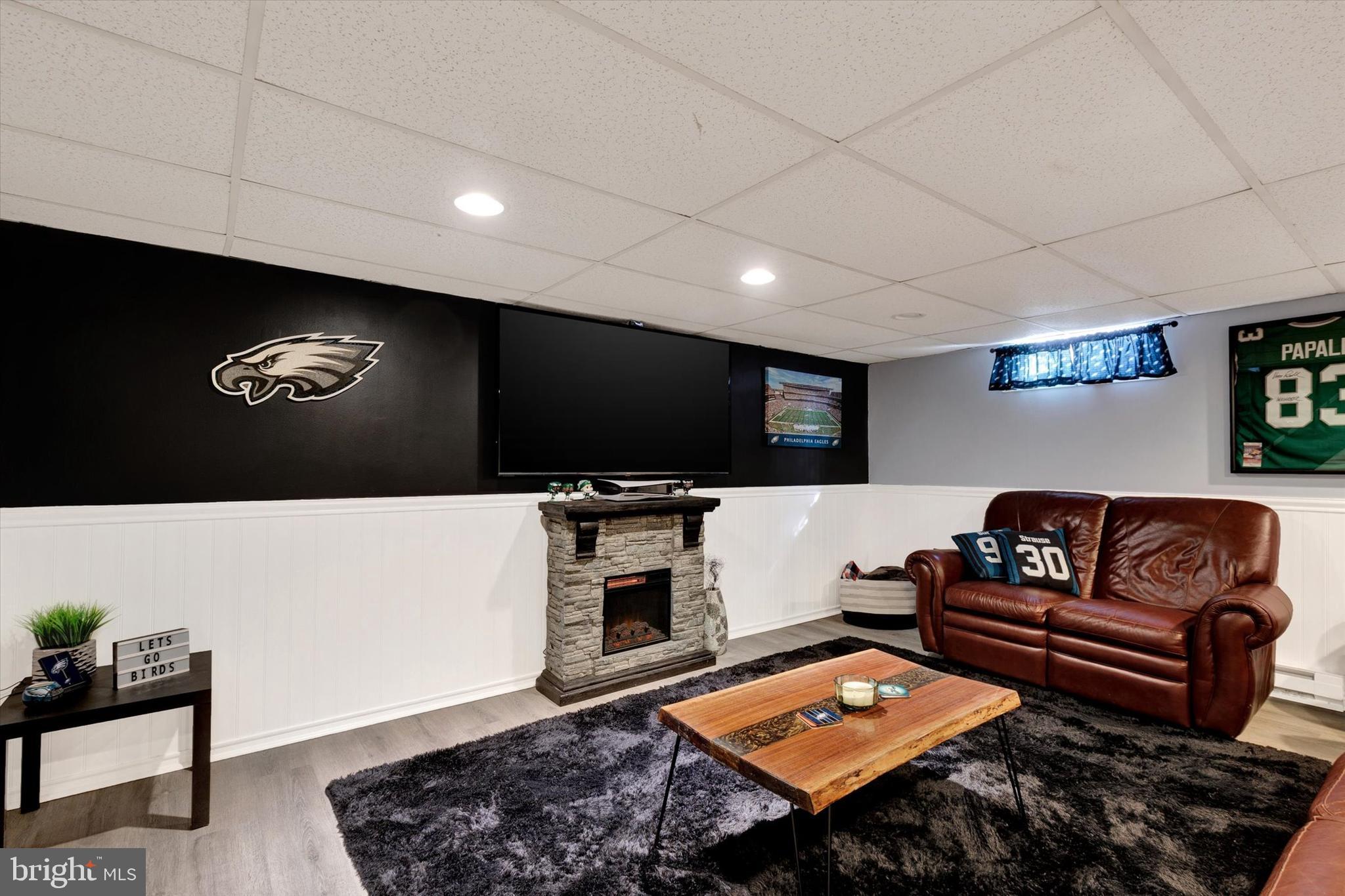 408 West 6th Street Lititz, PA 17543 - Photo 22 of 29 a living room with furniture and a flat screen tv