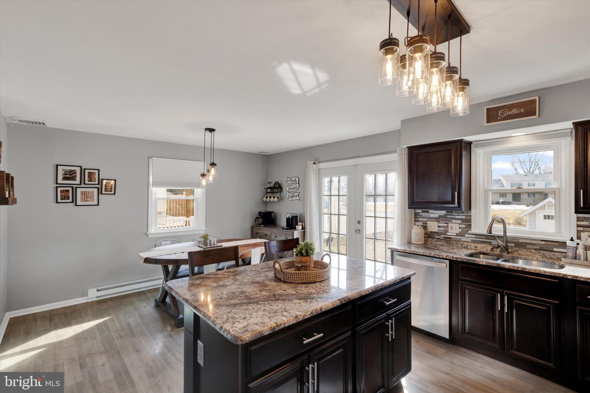 408 West 6th Street Lititz, PA 17543 - Photo 9 of 29 a kitchen with granite countertop a sink cabinets and window