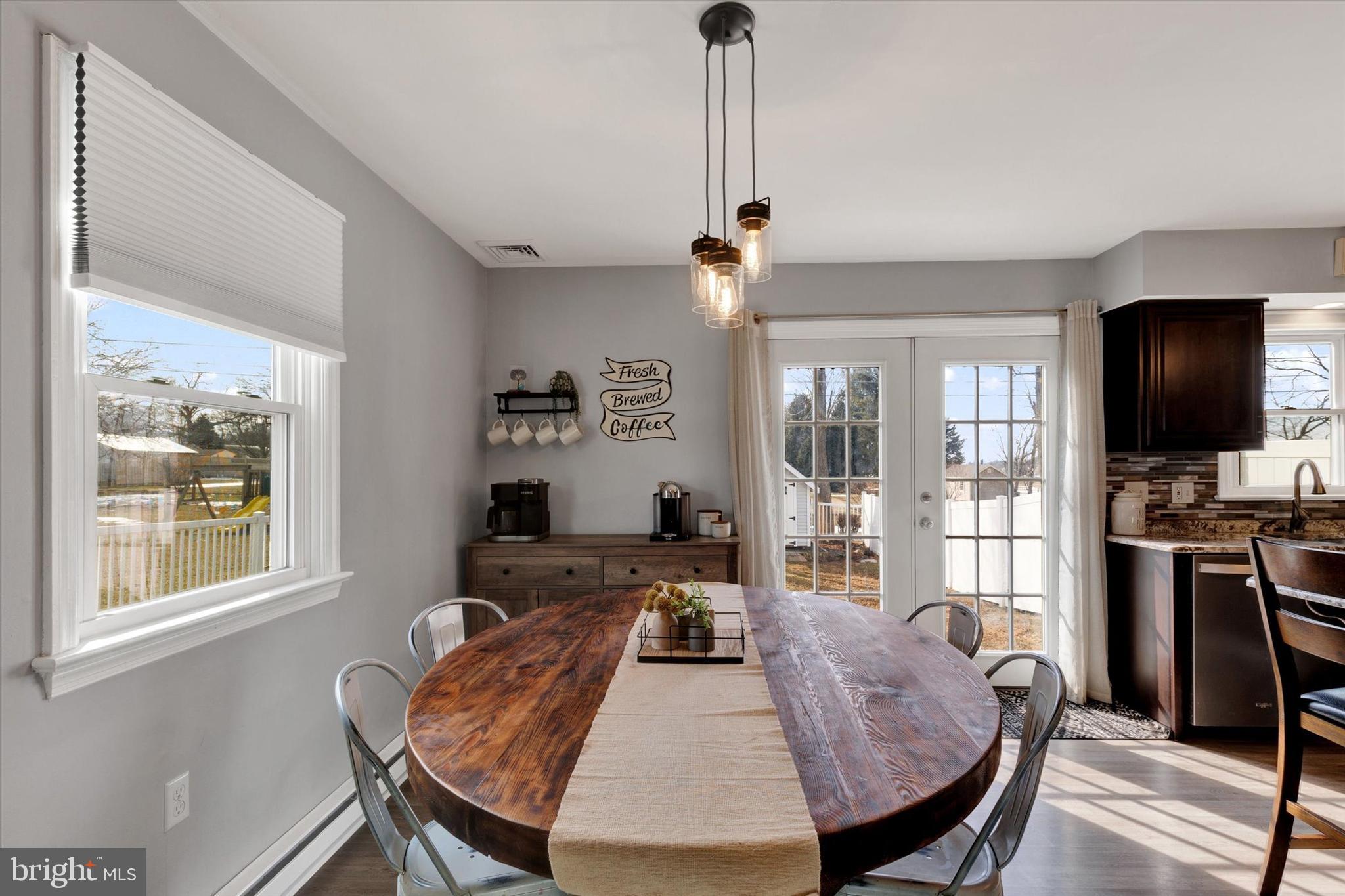 408 West 6th Street Lititz, PA 17543 - Photo 10 of 29 a living room with furniture a flat screen tv and windows