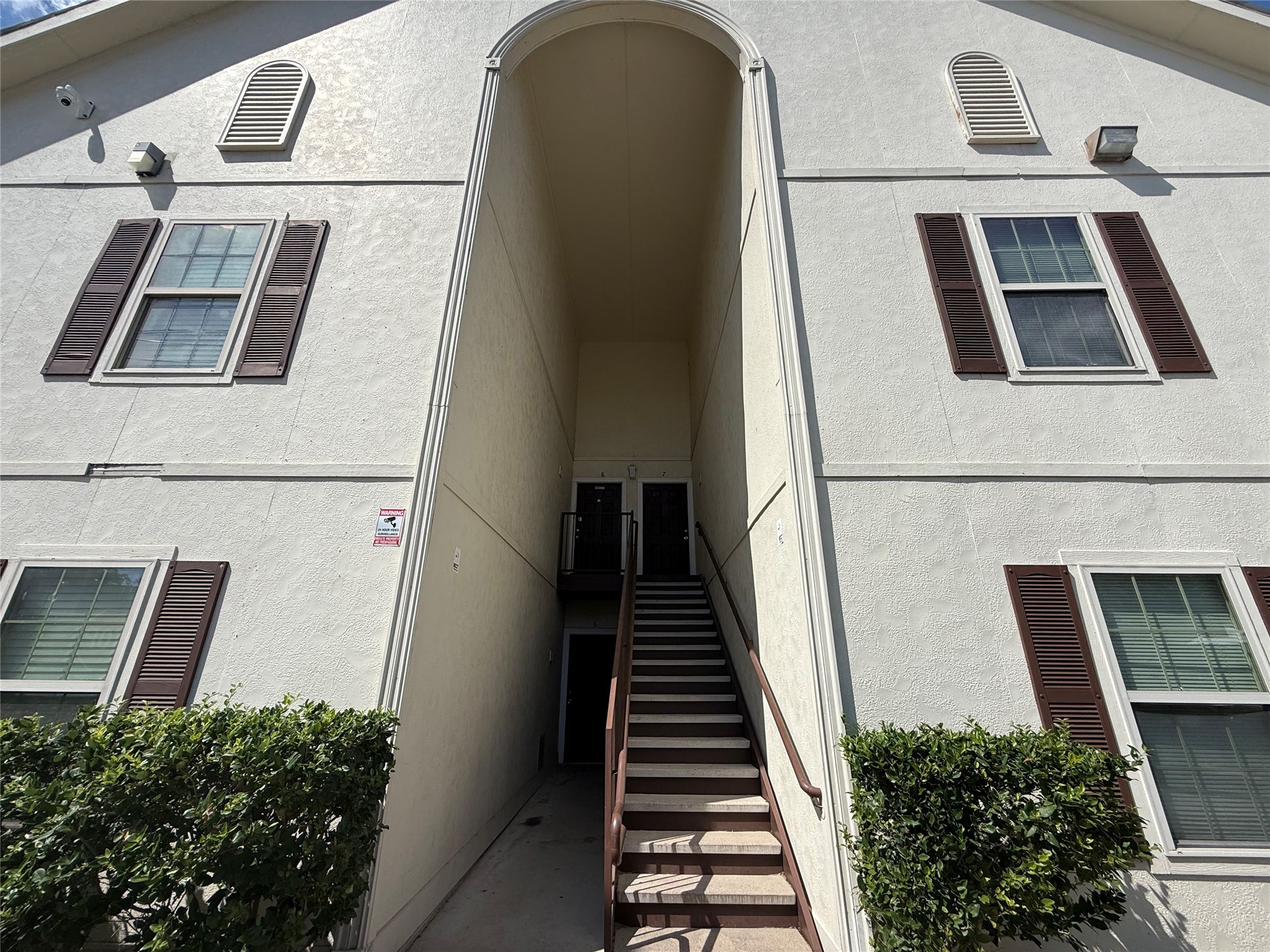 304 Dell Court, Unit 6 Houston, TX 77009 - Photo 2 of 14 a view of an entryway with staircase