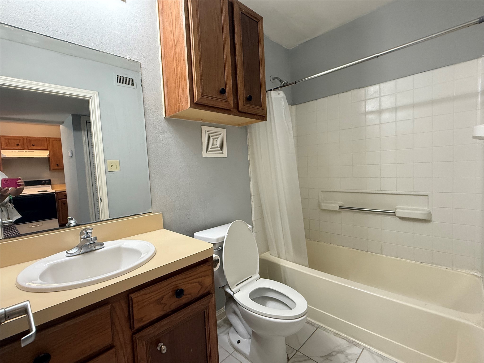 304 Dell Court, Unit 6 Houston, TX 77009 - Photo 9 of 14 a bathroom with a sink toilet and shower
