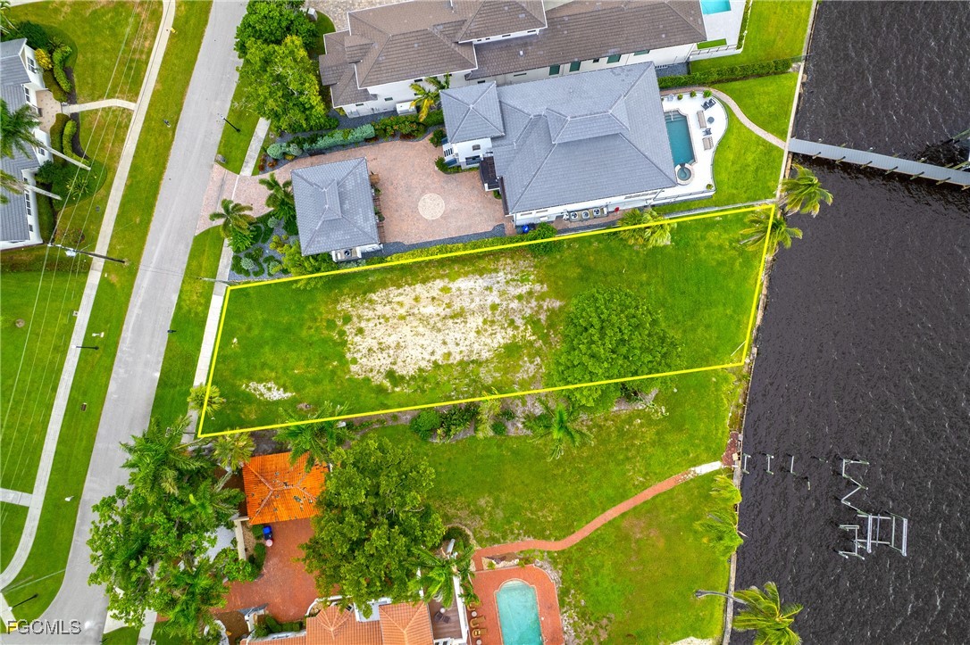 2904 Valencia Way Fort Myers, FL 33901 - Photo 4 of 14 an aerial view of residential houses with outdoor space and street view
