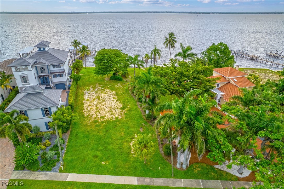 2904 Valencia Way Fort Myers, FL 33901 - Photo 7 of 14 an aerial view of a house with a yard