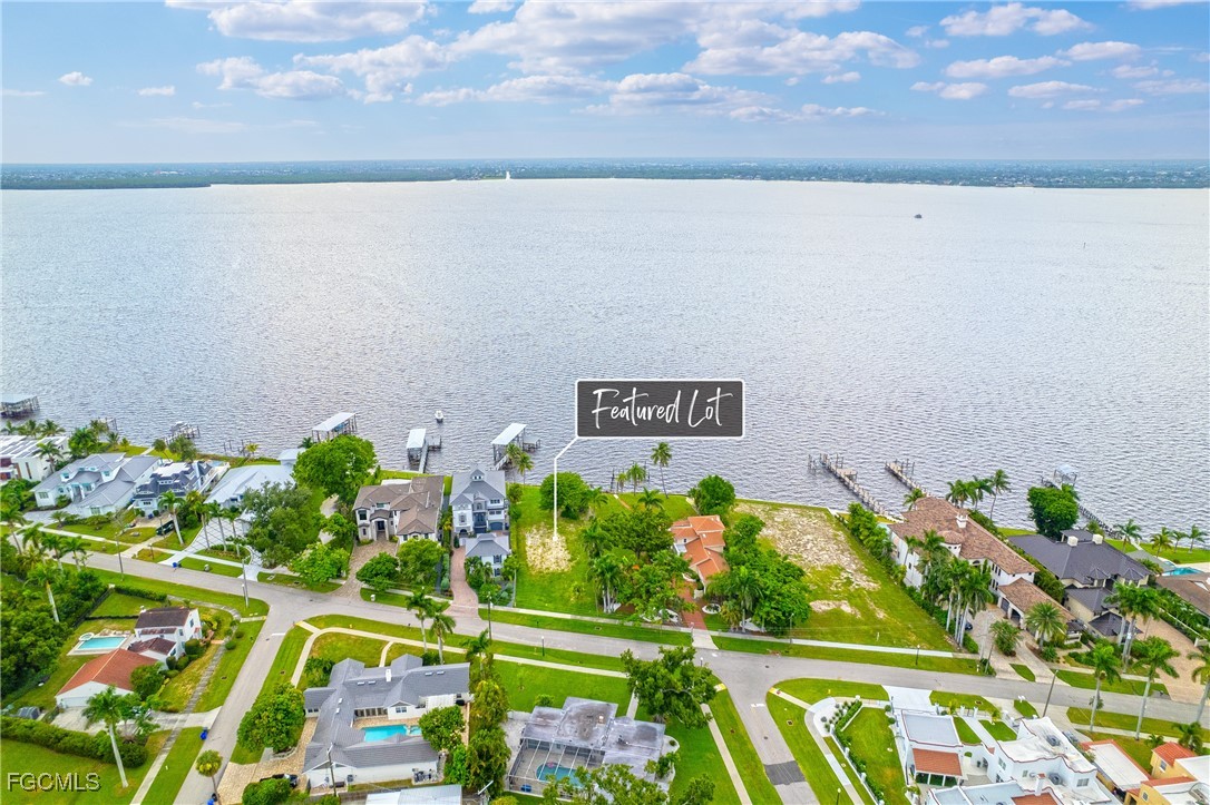 2904 Valencia Way Fort Myers, FL 33901 - Photo 9 of 14 a view of swimming pool with a yard