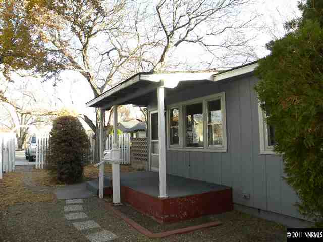 825 Bell Street Reno, NV 89503 - Photo 1 of 13 a view of a house with a tree