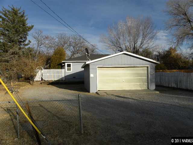 825 Bell Street Reno, NV 89503 - Photo 13 of 13 a front view of a house with a yard and garage