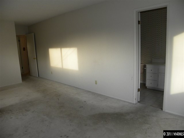 825 Bell Street Reno, NV 89503 - Photo 10 of 13 an empty room with a window and a bathroom