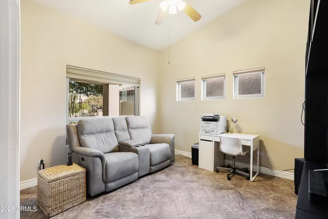 a view of living room with granite countertop furniture and fireplace