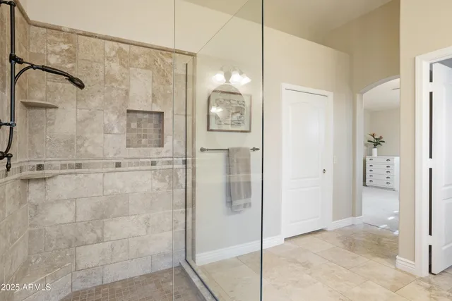a view of storage and utility room with washer and dryer