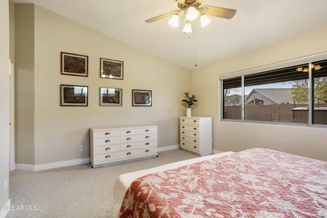 a building outdoor space with patio furniture and potted plants