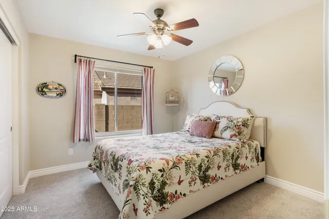 a view of a porch with chairs and floor