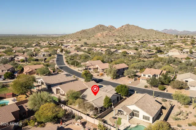 a view of a hallway with a glass door and a window