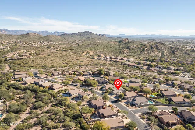 a living room with furniture a rug and a window