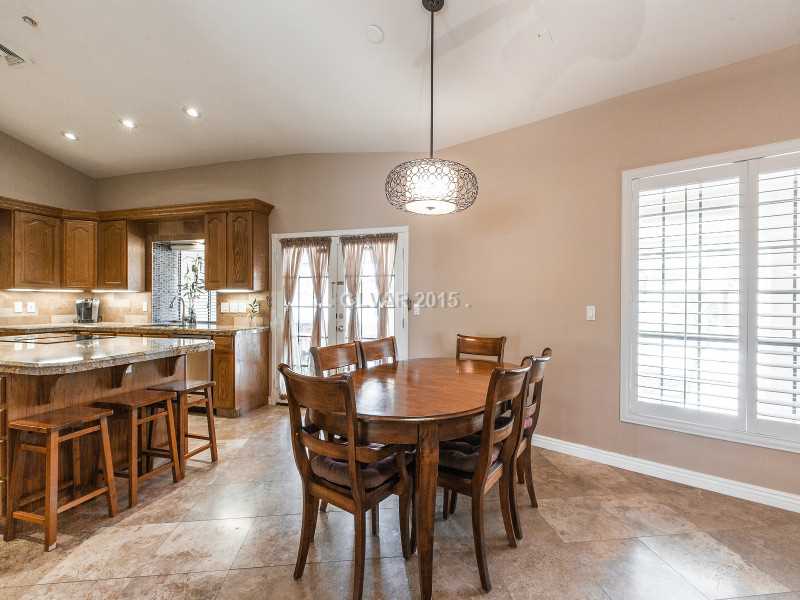 351 East Robindale Road Las Vegas, NV 89123 - Photo 13 of 35 Property Photo. Breakfast Nook- Light fixture does not convey with the sale of the home.