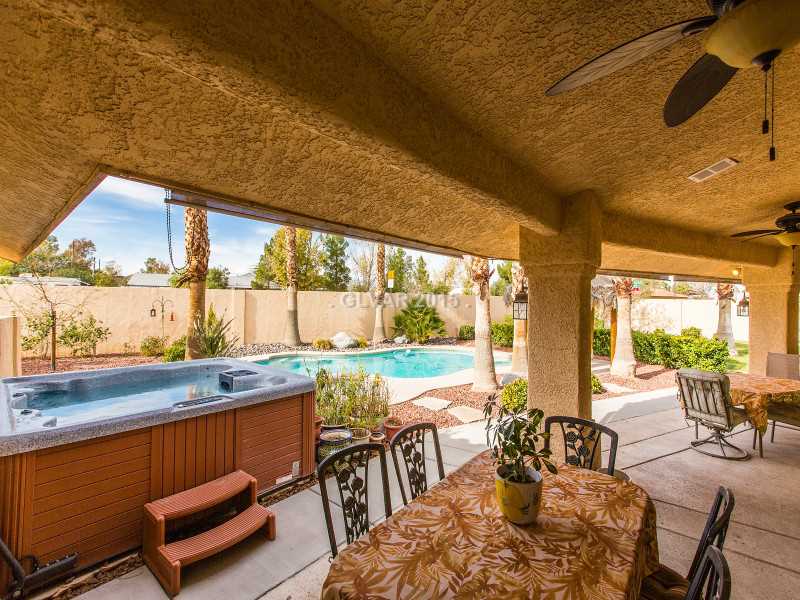 351 East Robindale Road Las Vegas, NV 89123 - Photo 34 of 35 Patio/Deck. Above ground spa does not convey with the sale of the home.