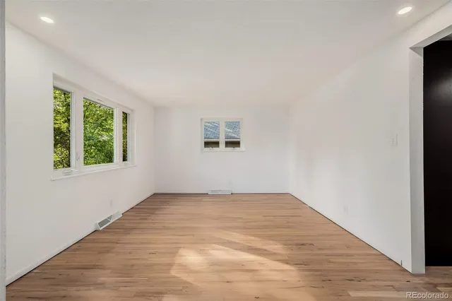 an empty room with windows