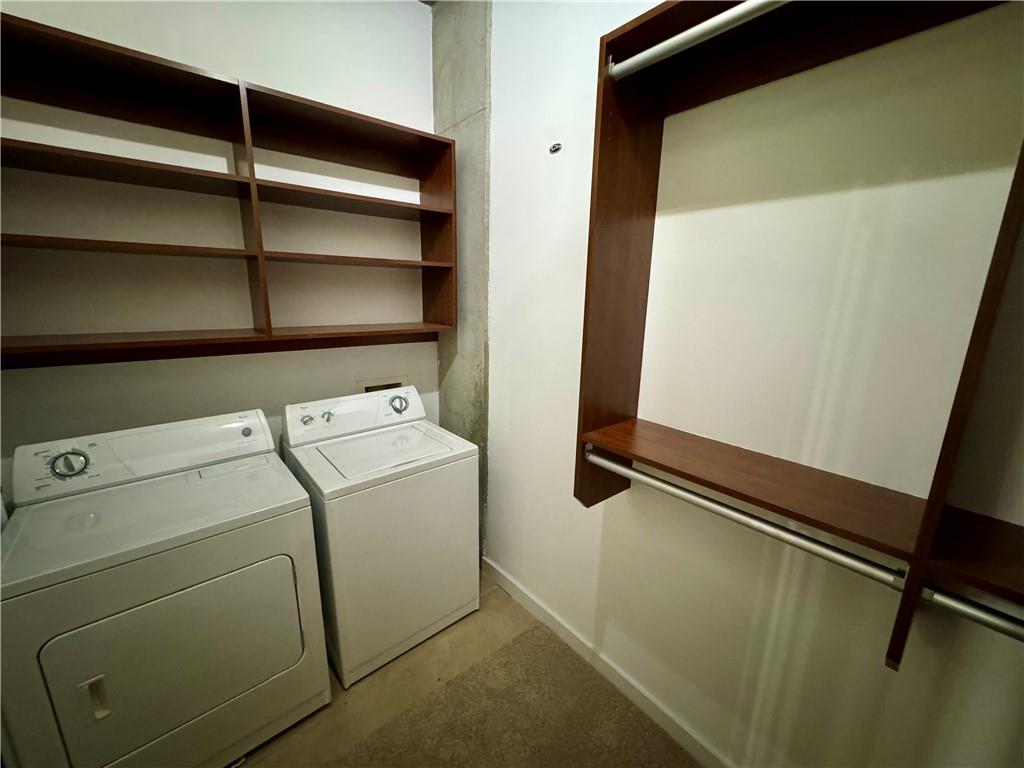 3324 Peachtree Road Northeast, Unit 2307 Atlanta, GA 30326 - Photo 19 of 42 a utility room with dryer and washer