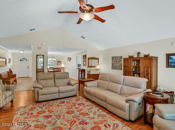 1910 Shadow Ridge Trail Jacksonville, FL 32225 - Photo 13 of 21 a living room with furniture and a rug