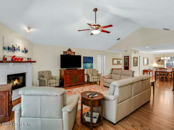 1910 Shadow Ridge Trail Jacksonville, FL 32225 - Photo 14 of 21 a living room with furniture and a fireplace