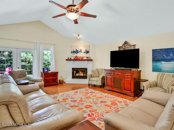 1910 Shadow Ridge Trail Jacksonville, FL 32225 - Photo 16 of 21 a living room with furniture and a flat screen tv