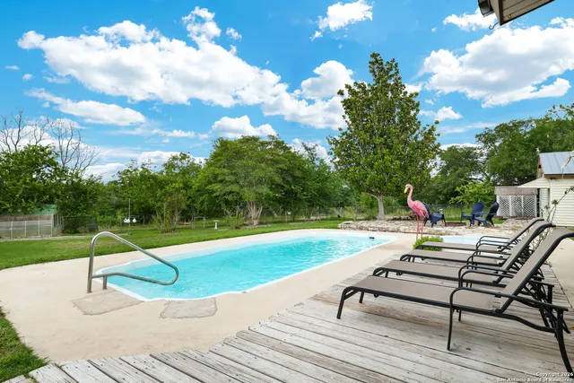 a garden view with a seating space