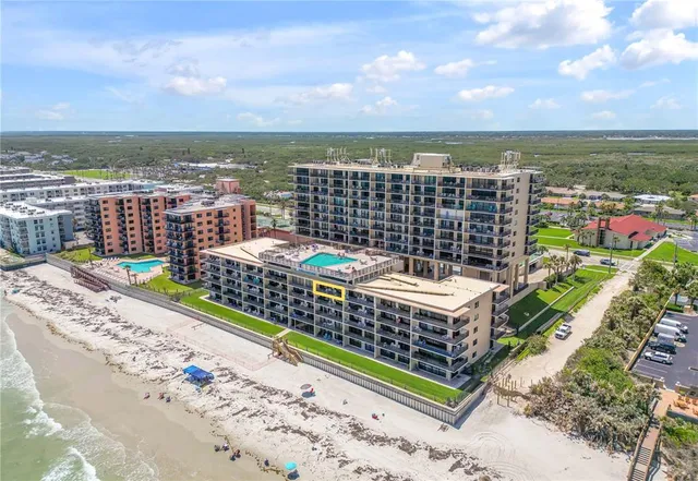 a view of a city with a lake