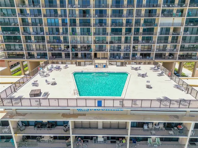 a view of pool with building