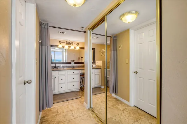 a bathroom with a shower and a sink