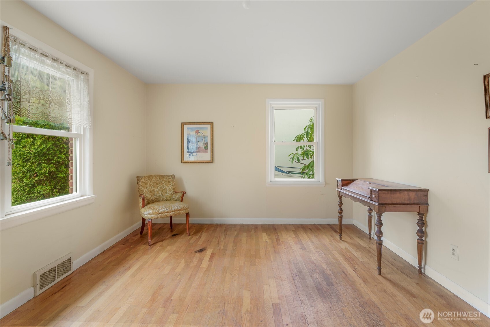 1020 Puget Drive Edmonds, WA 98020 - Photo 9 of 22 a living room with furniture and a window