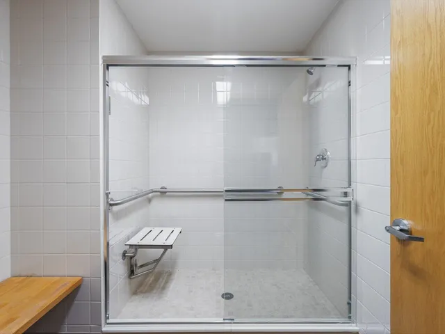 a kitchen with stainless steel appliances a refrigerator sink and cabinets
