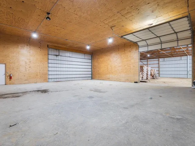 a view of outdoor space with swimming pool and green space