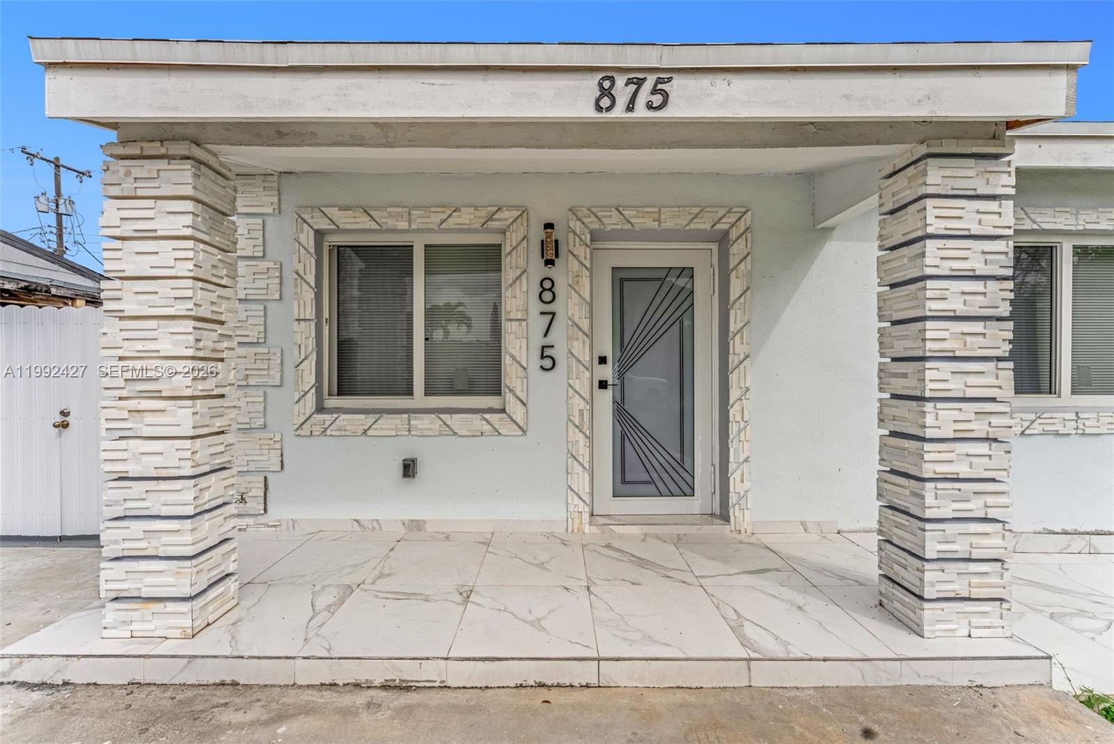 875 East 8th Street Hialeah, FL 33010 - Photo 2 of 36 a view of entrance