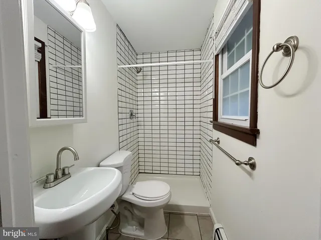 a view of a livingroom with wooden floor