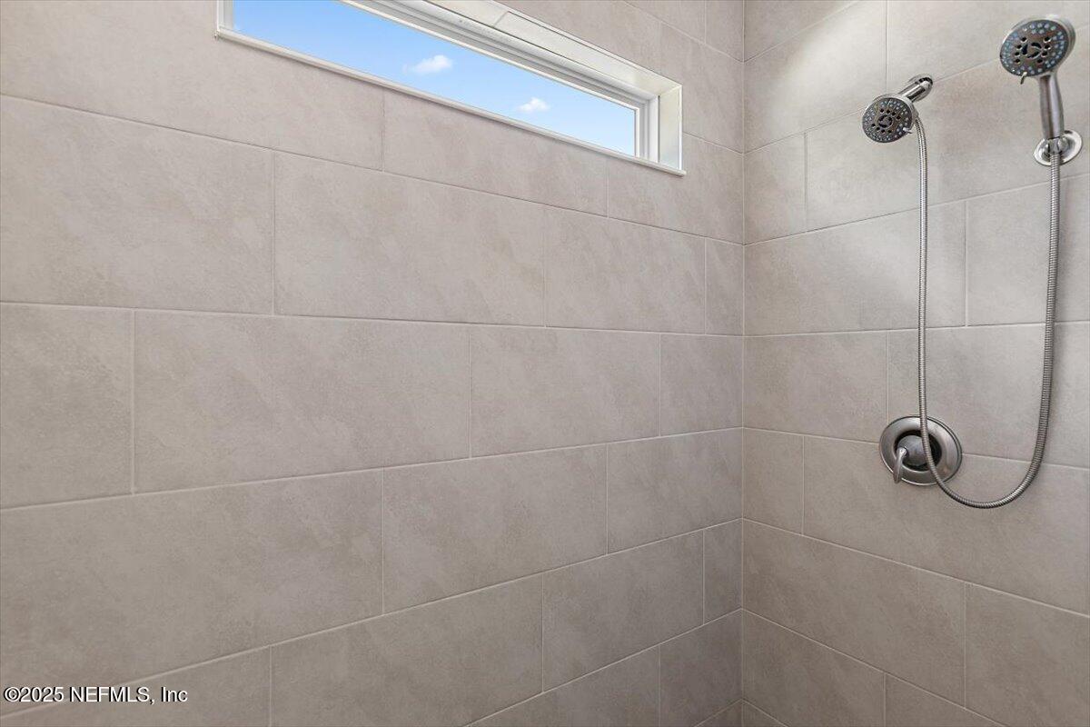 21 Pine Candle Way St. Augustine, FL 32092 - Photo 12 of 35 a bathroom with a shower