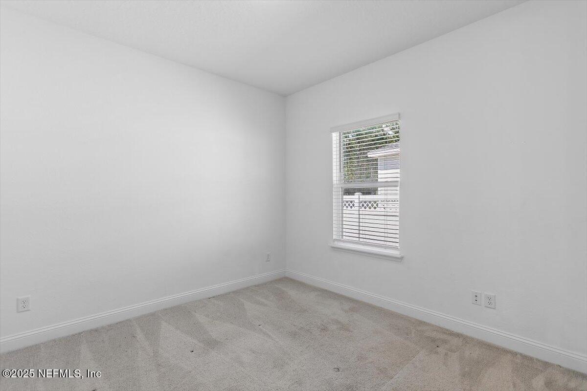 21 Pine Candle Way St. Augustine, FL 32092 - Photo 16 of 35 an empty room with a window