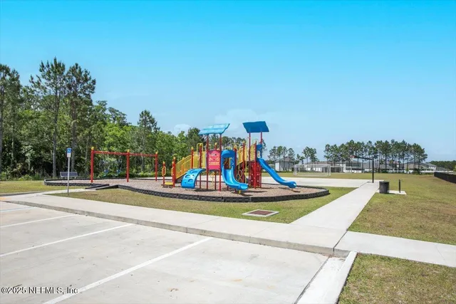 a view of a swimming pool with a lake view