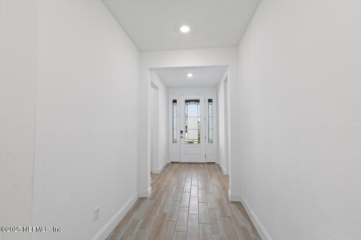 21 Pine Candle Way St. Augustine, FL 32092 - Photo 3 of 35 a view of hallway with wooden floor